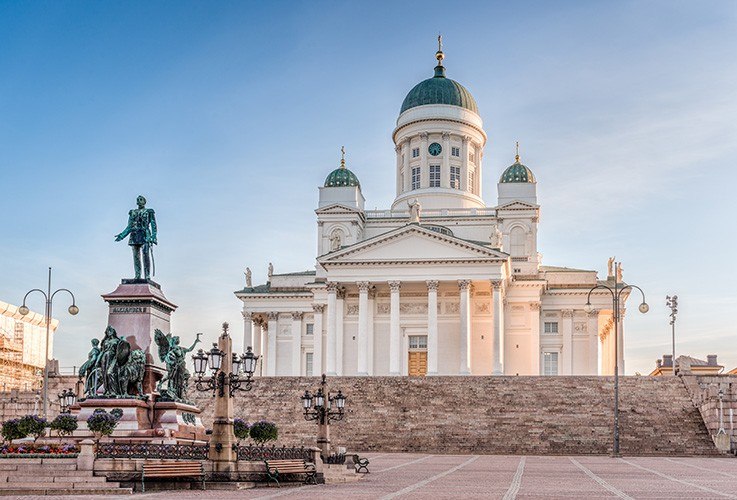 Large building with statue in front