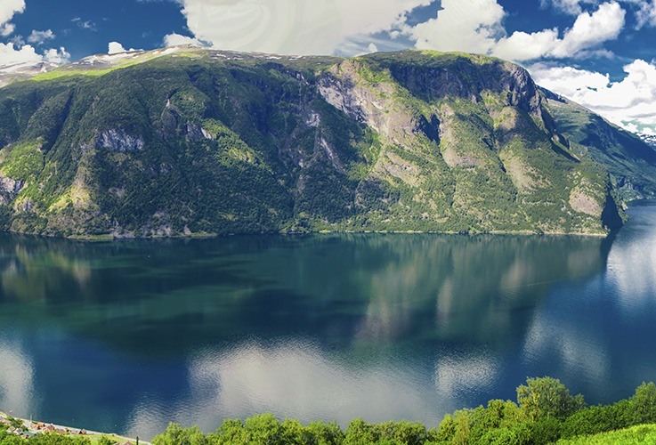 Green hills over water in Norway
