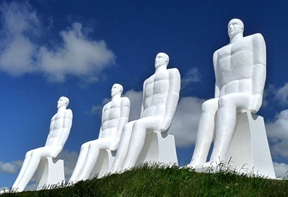Row of large statues of men