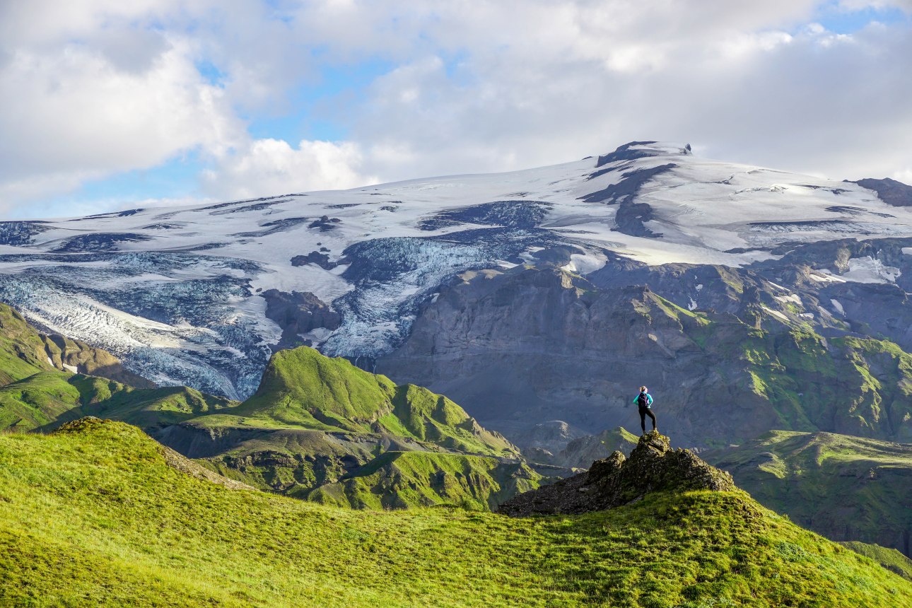 man overlooking mountains in iceland
