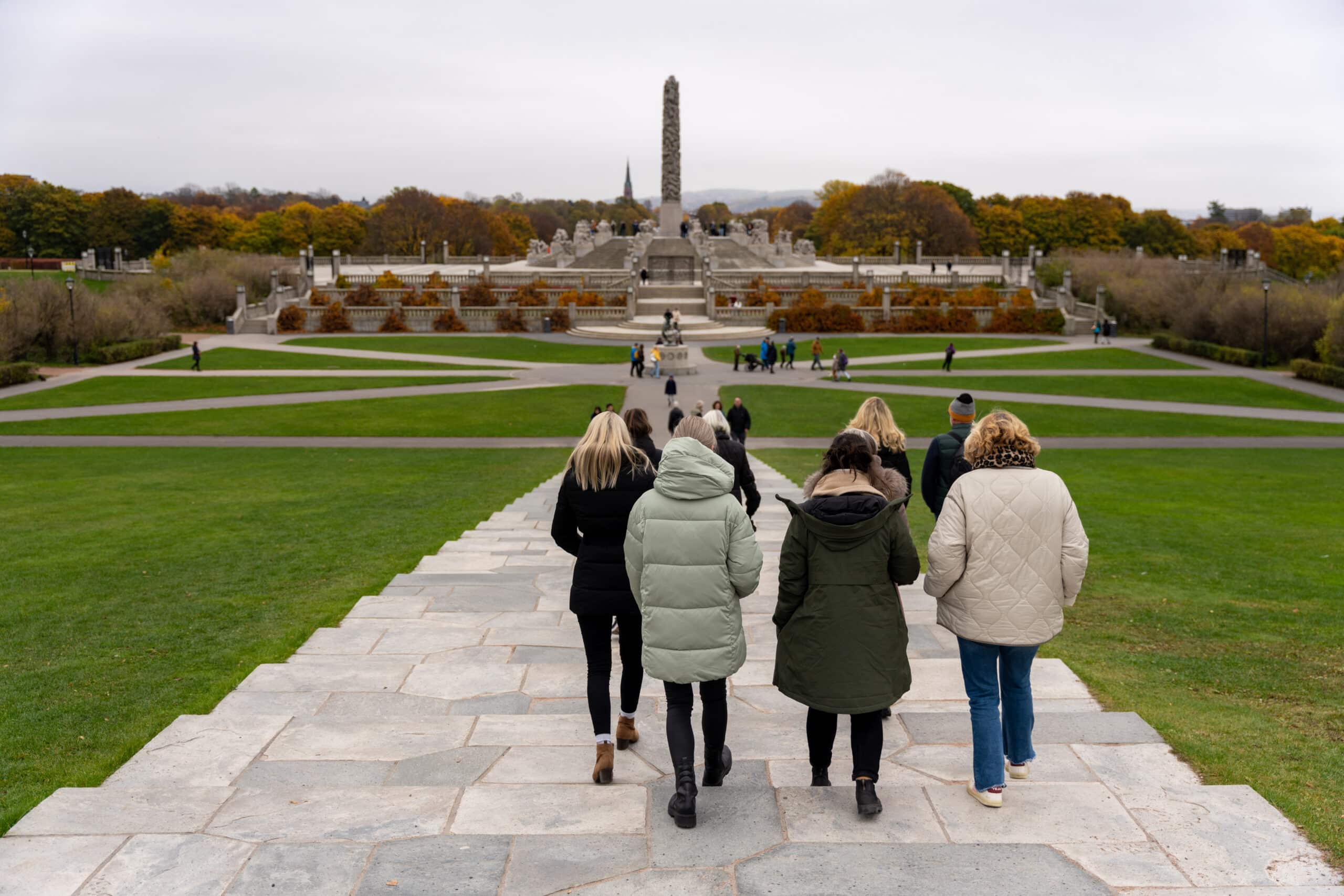 Group of people going towards the Monolith in the Vigeland Park